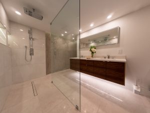wheelchair friendly bathroom with open shower