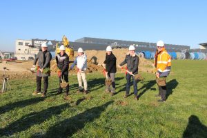 construction of new building with men wearing hard hats