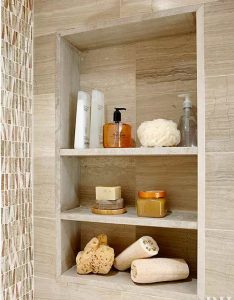 cubby hole in bathroom shower tile wall