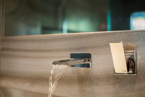 motion sensor faucet in bathroom design