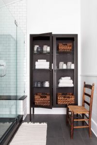 tall storage cabinet in small bathroom design